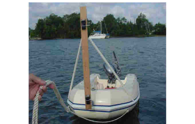 dinghy being towed with measuring equipment on it