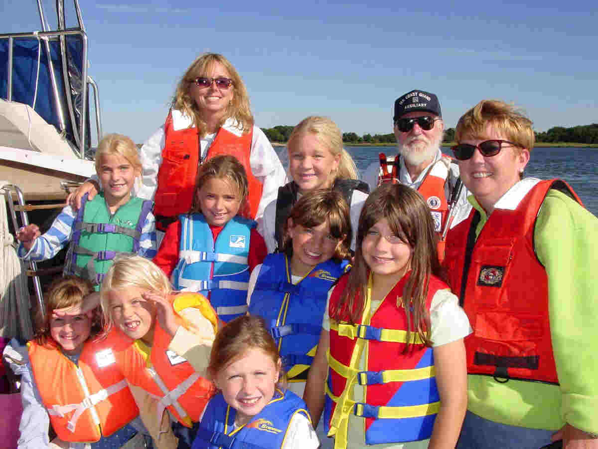 People with Life Jackets